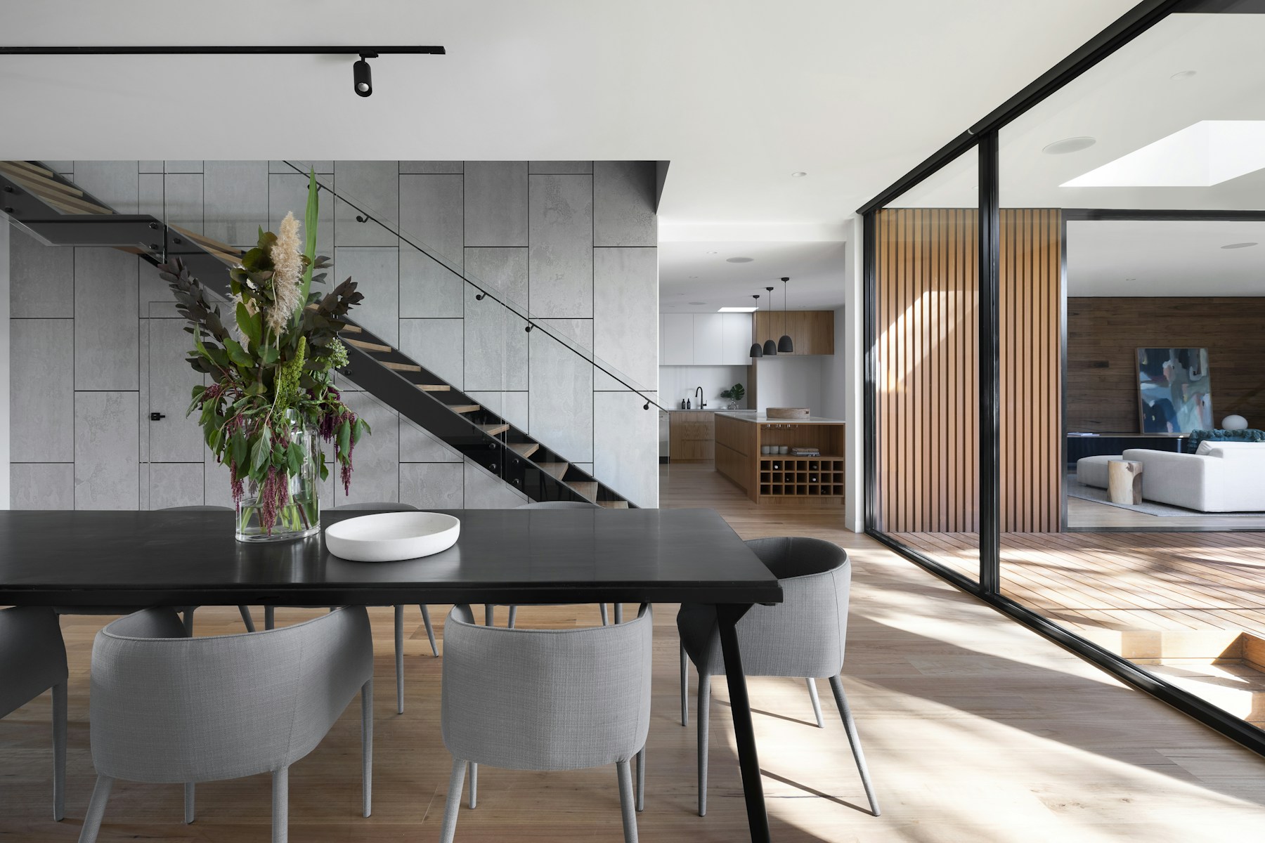 Sunlit contemporary room with elegant wallcovering